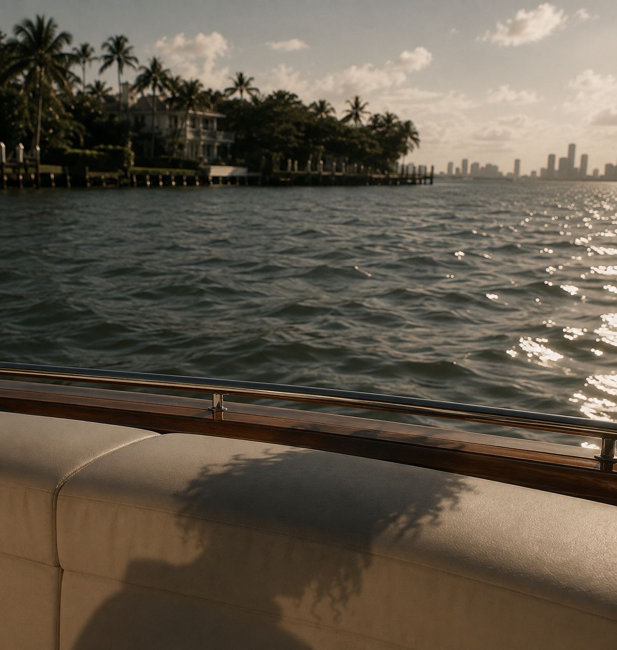 A shadow reflected on a boat seat with water beyond
